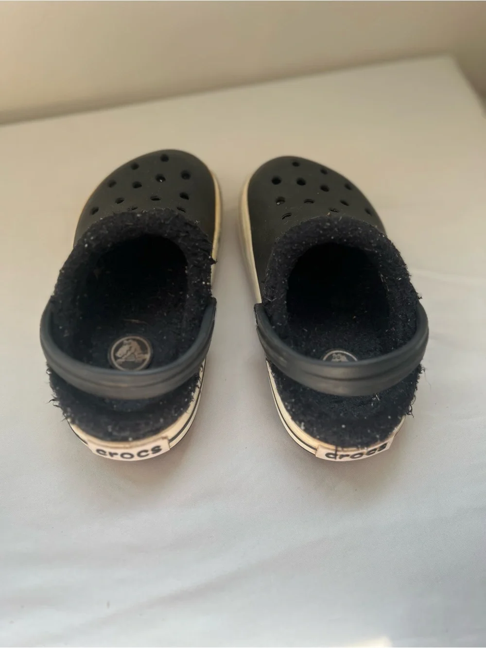 CROCS Kids Black Fleece-Lined Clogs with White Trim